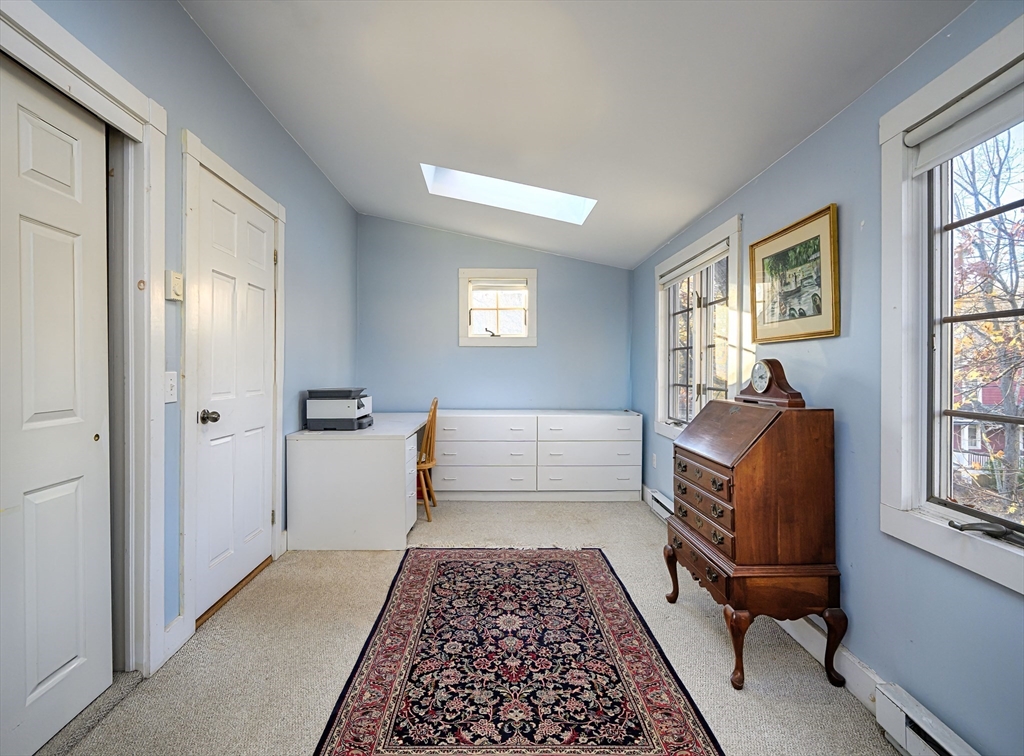 31 Marion Street Natick, MA 01760 - Photo 25 of 32 a bedroom with furniture and a window