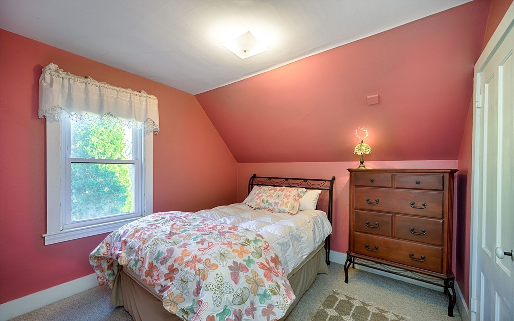 31 Marion Street Natick, MA 01760 - Photo 26 of 32 a bedroom with a bed and a window