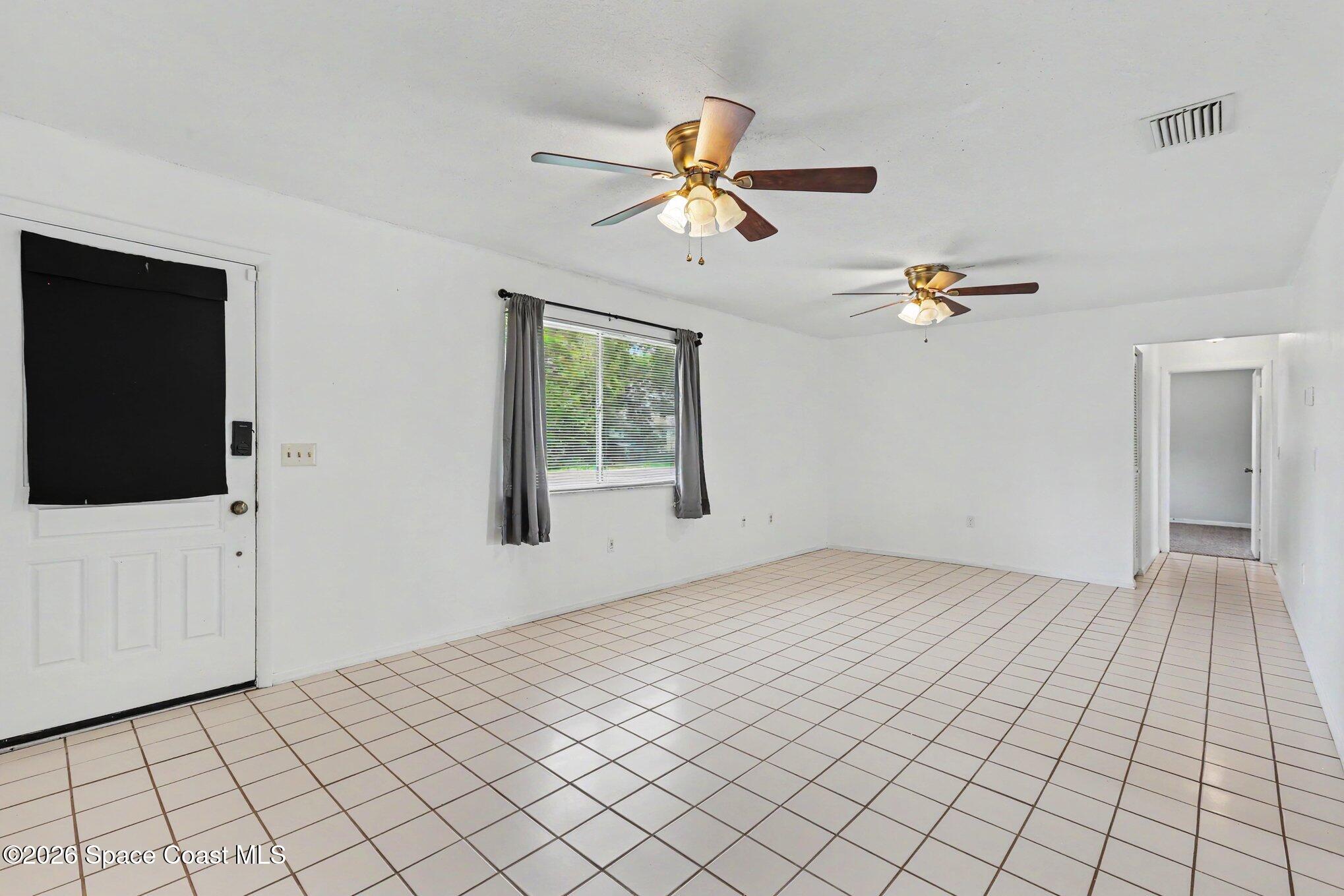 953 Cherokee Road Southeast Palm Bay, FL 32909 - Photo 8 of 33 005_file_5061
