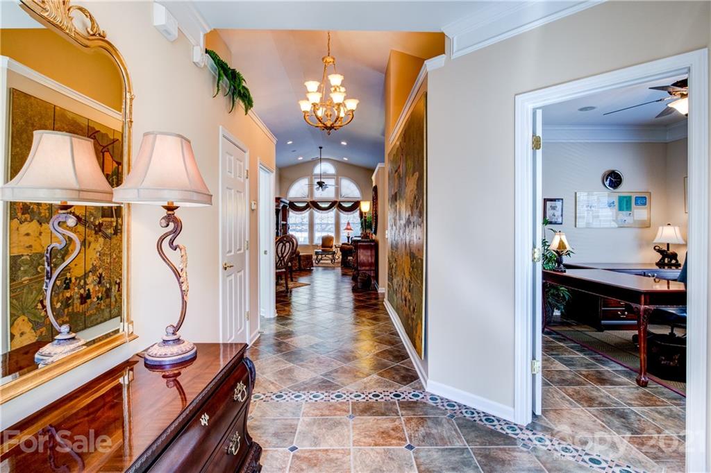 3237 Sapphire Lane Fort Mill, SC 29708 - Photo 4 of 33 a view of a dining room with furniture and chandelier