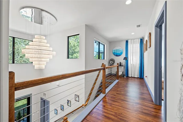 a view of a two chairs in the balcony