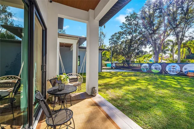 a view of house with yard