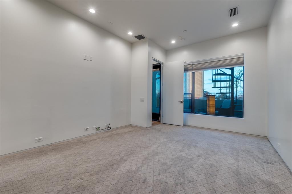 1505 North Haskell Avenue, Unit 3 Dallas, TX 75204 - Photo 19 of 28 an empty room with entrance and windows