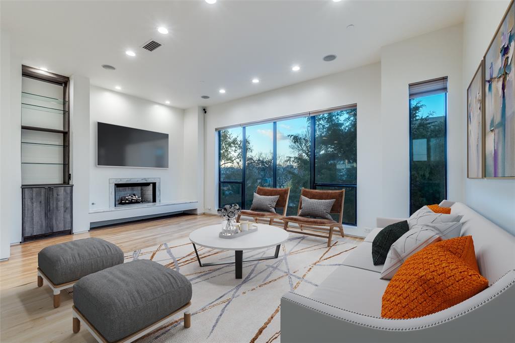 1505 North Haskell Avenue, Unit 3 Dallas, TX 75204 - Photo 7 of 28 a living room with furniture and a flat screen tv
