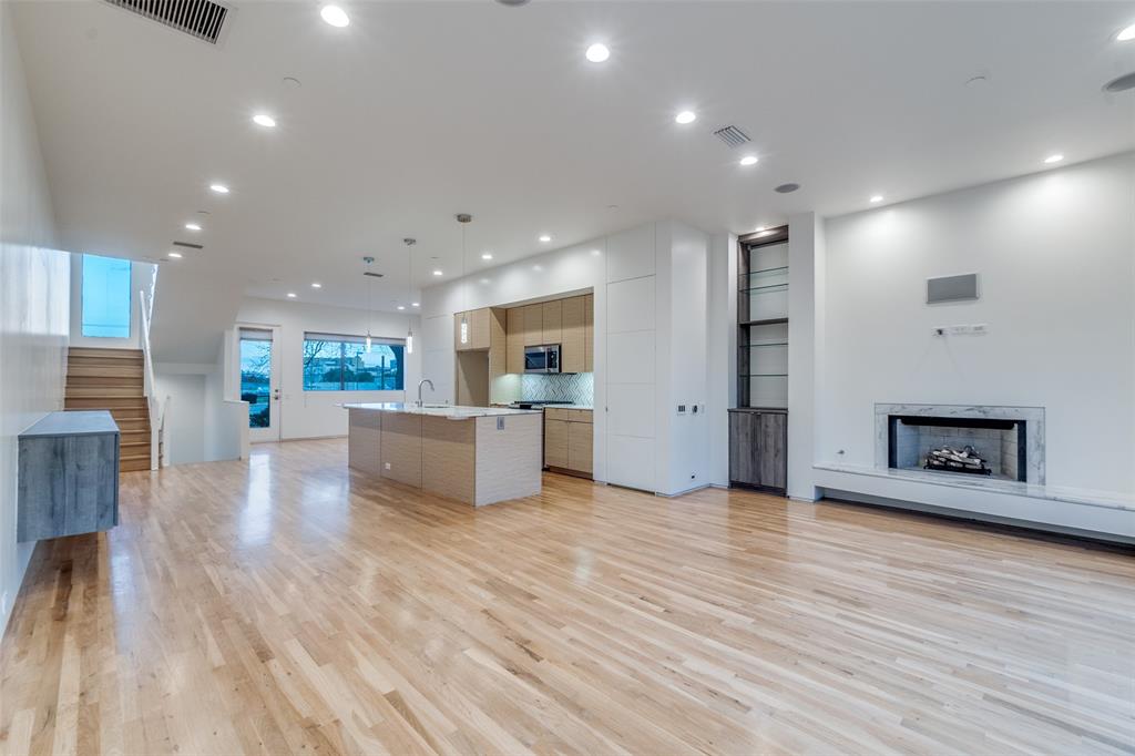 1505 North Haskell Avenue, Unit 3 Dallas, TX 75204 - Photo 8 of 28 a view of kitchen with cabinets and wooden floor