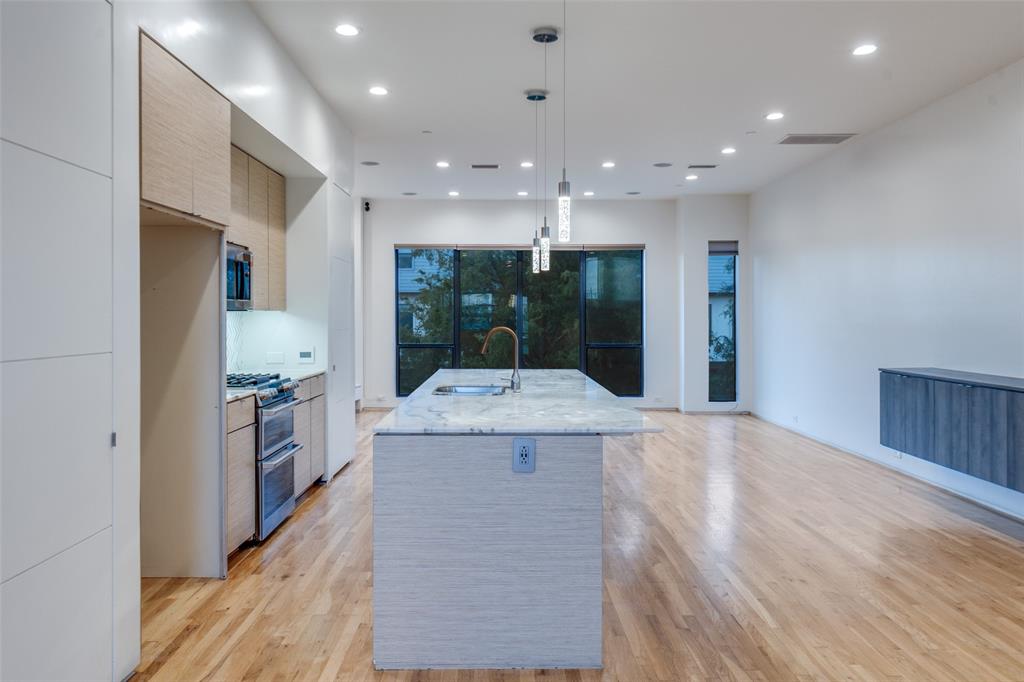 1505 North Haskell Avenue, Unit 3 Dallas, TX 75204 - Photo 10 of 28 a view of kitchen with cabinets and stainless steel appliances