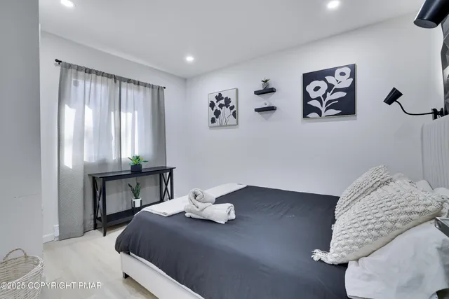 a living room with a couch and a flat screen tv