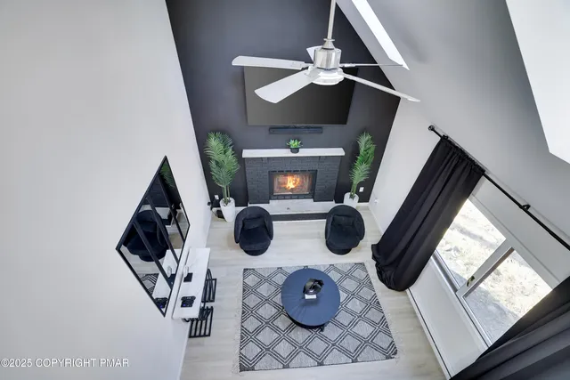 a living room with furniture and a table