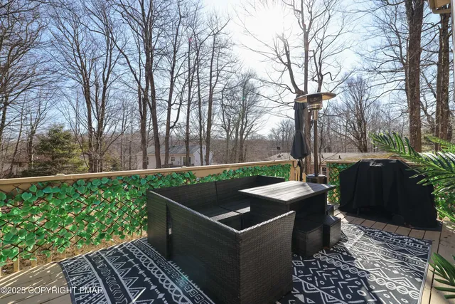 front view of a house with a large window