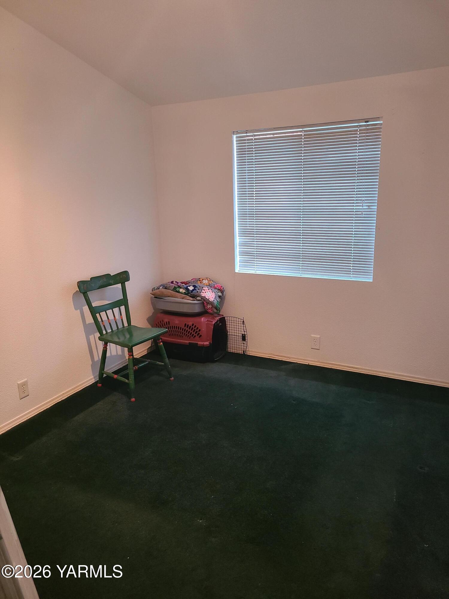 10608 Hackett Road Yakima, WA 98903 - Photo 21 of 25 a room with furniture and a window