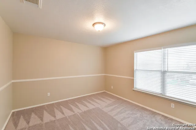 a view of a room with a window