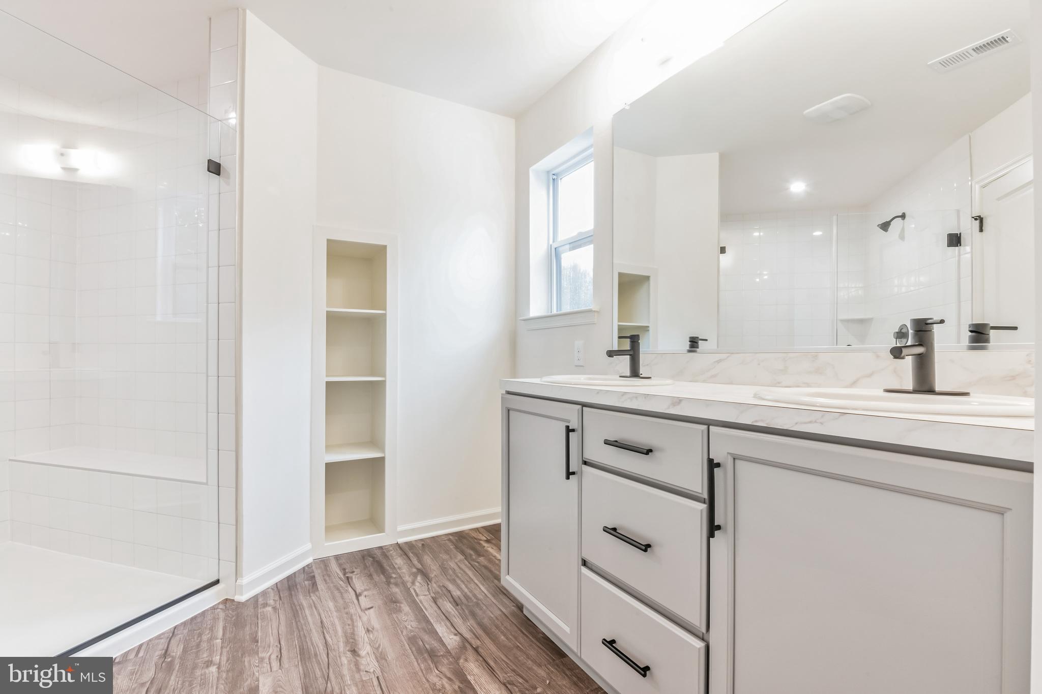 4 Sandcastle Drive Ocean View, NJ 08230 - Photo 19 of 28 a bathroom with a double vanity sink mirror and