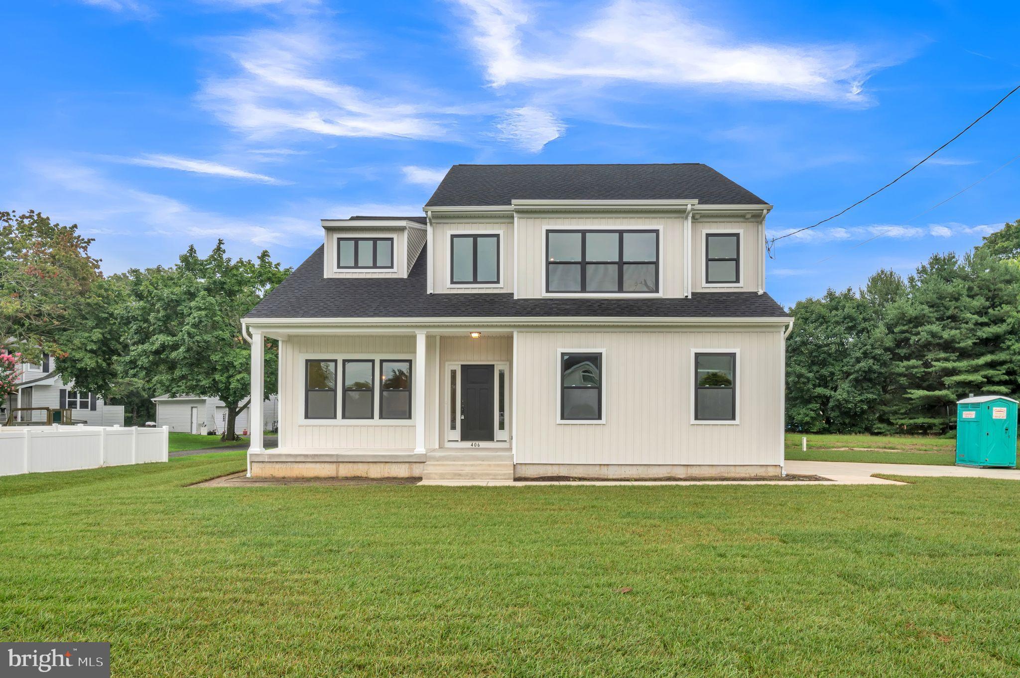 4 Sandcastle Drive Ocean View, NJ 08230 - Photo 3 of 28 a front view of a house with a garden