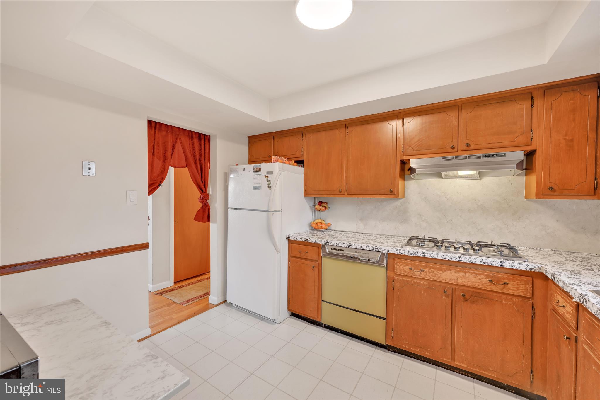 1137 Nissley Road Lancaster, PA 17601 - Photo 12 of 33 a kitchen with stainless steel appliances granite countertop a refrigerator and a sink