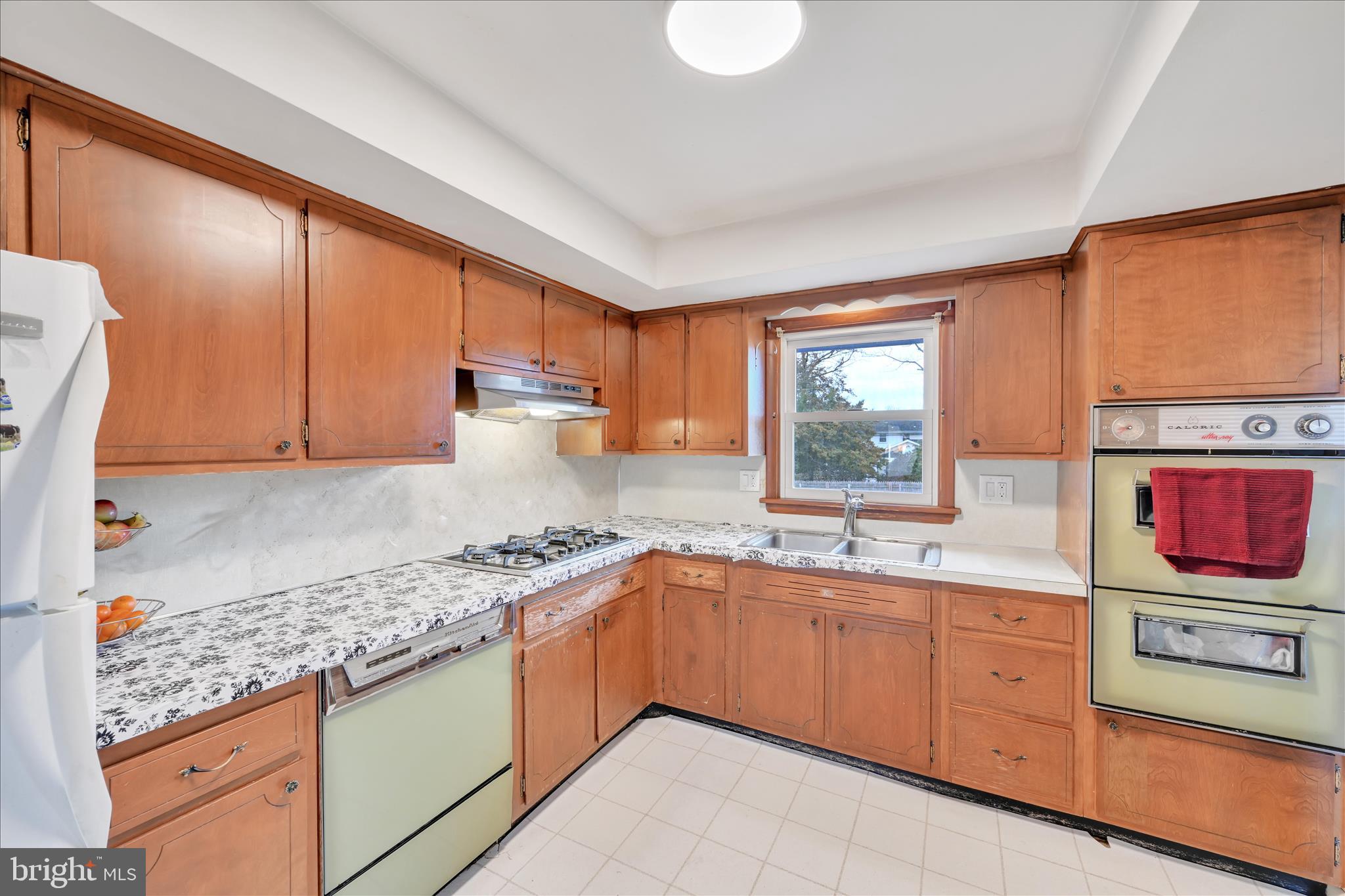 1137 Nissley Road Lancaster, PA 17601 - Photo 13 of 33 a kitchen with stainless steel appliances granite countertop a sink stove and cabinets