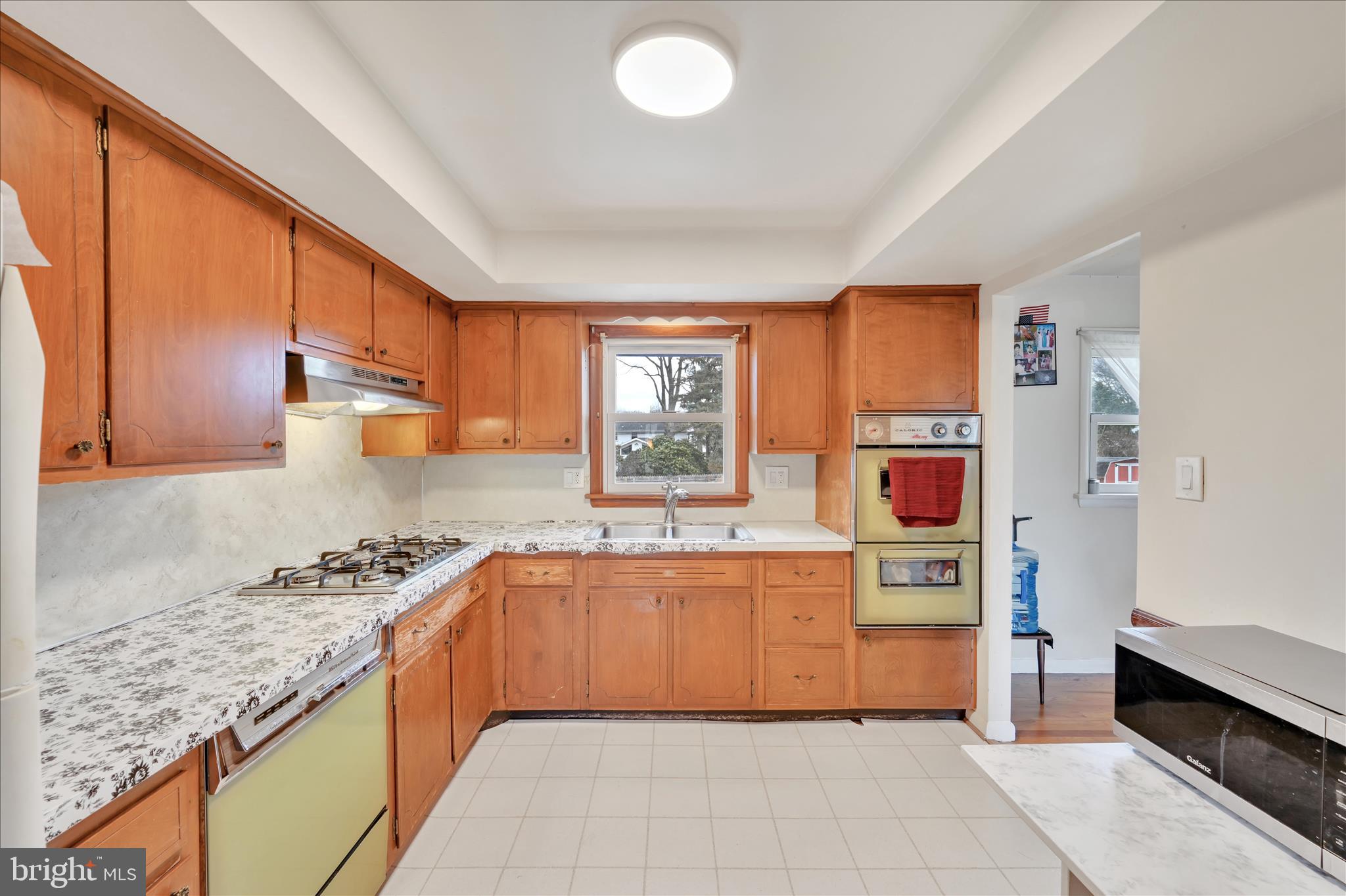 1137 Nissley Road Lancaster, PA 17601 - Photo 14 of 33 a kitchen with stainless steel appliances granite countertop a sink and cabinets