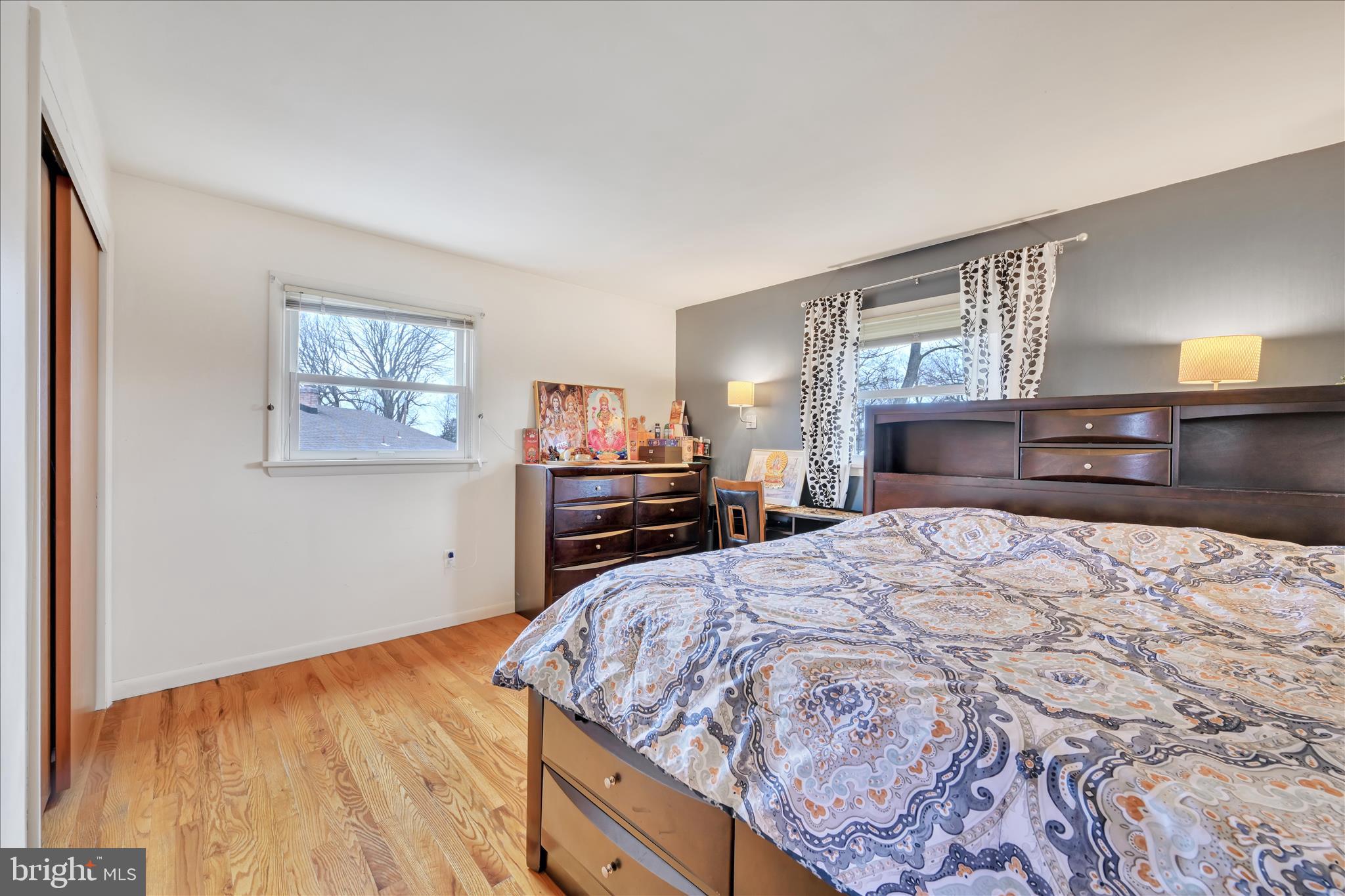 1137 Nissley Road Lancaster, PA 17601 - Photo 15 of 33 a bedroom with a large bed and dresser