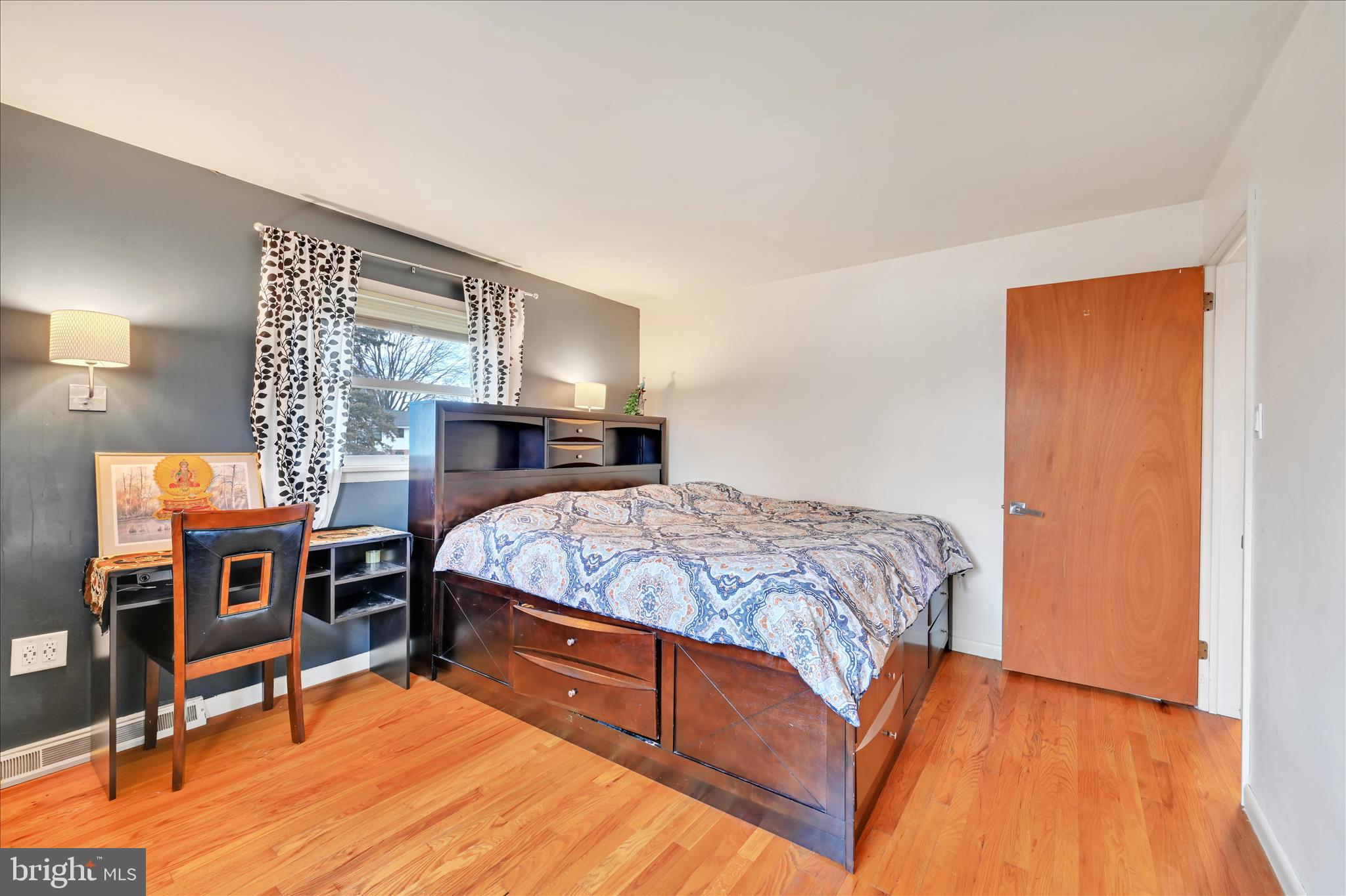 1137 Nissley Road Lancaster, PA 17601 - Photo 16 of 33 a bedroom with a bed a table and chair