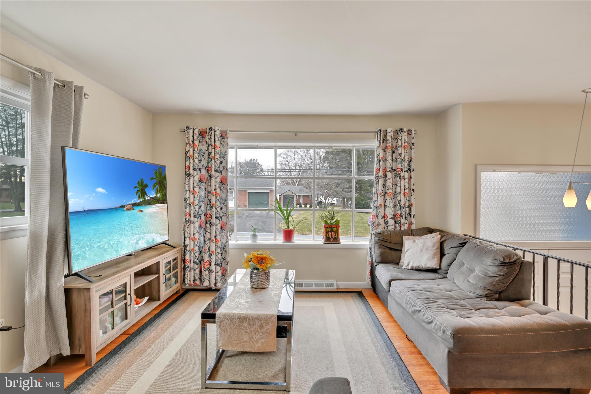 1137 Nissley Road Lancaster, PA 17601 - Photo 6 of 33 a living room with furniture and a flat screen tv