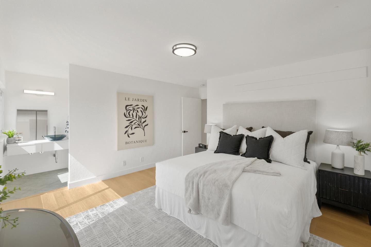 4624 Fuller Street Santa Clara, CA 95054 - Photo 14 of 26 a spacious bedroom with a bed and couch