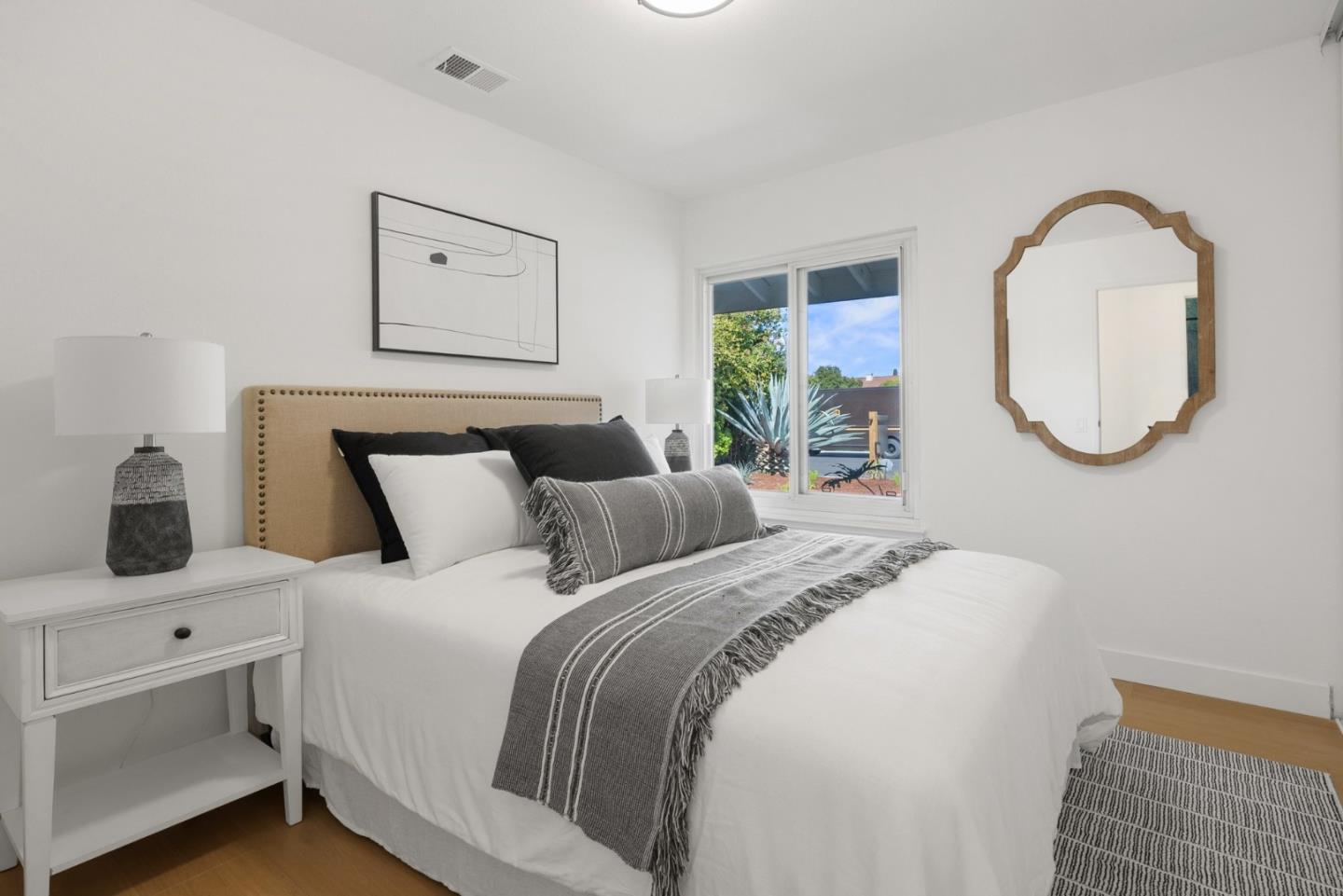 4624 Fuller Street Santa Clara, CA 95054 - Photo 17 of 26 a bedroom with bed and a window