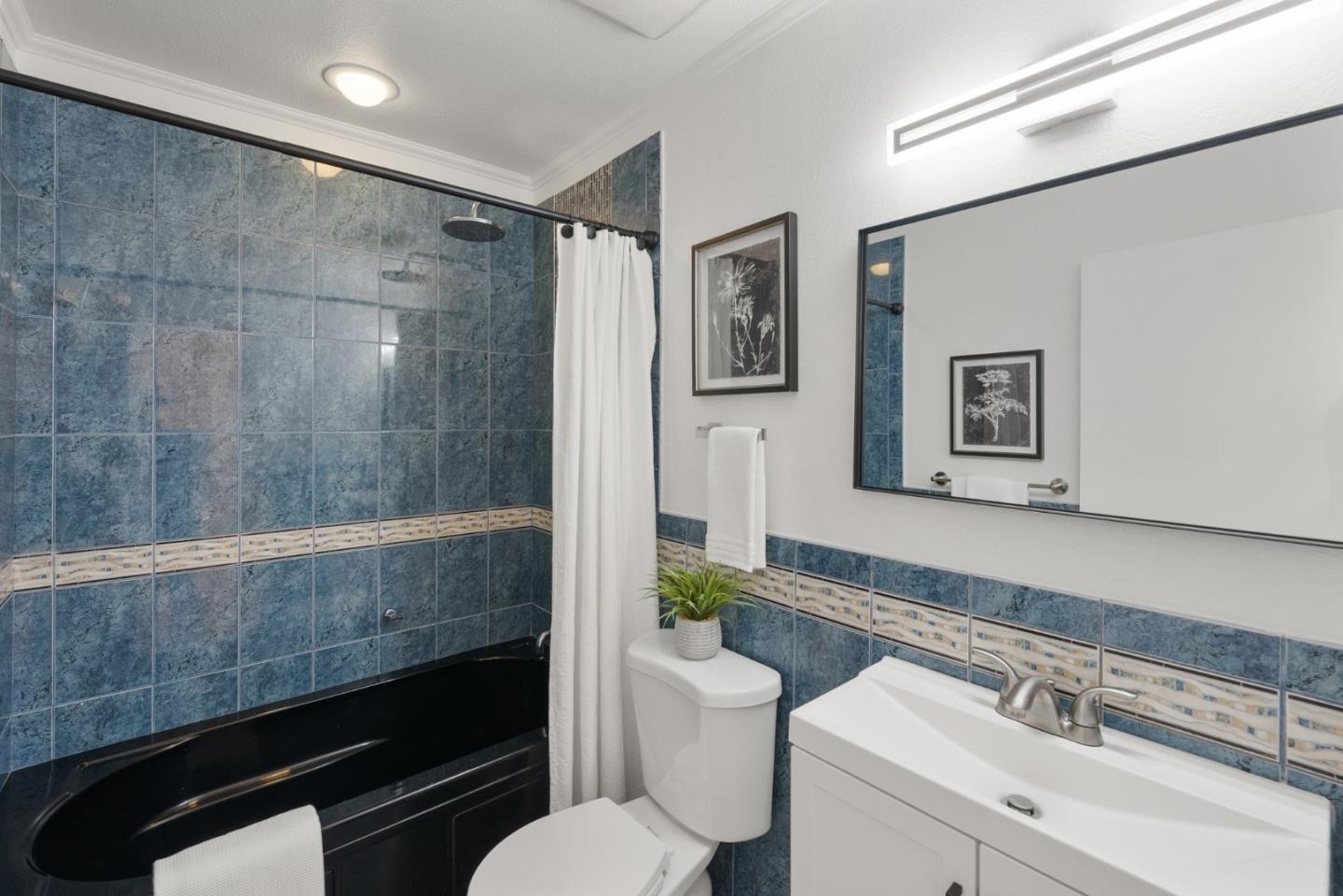 4624 Fuller Street Santa Clara, CA 95054 - Photo 20 of 26 a bathroom with a sink a toilet and shower