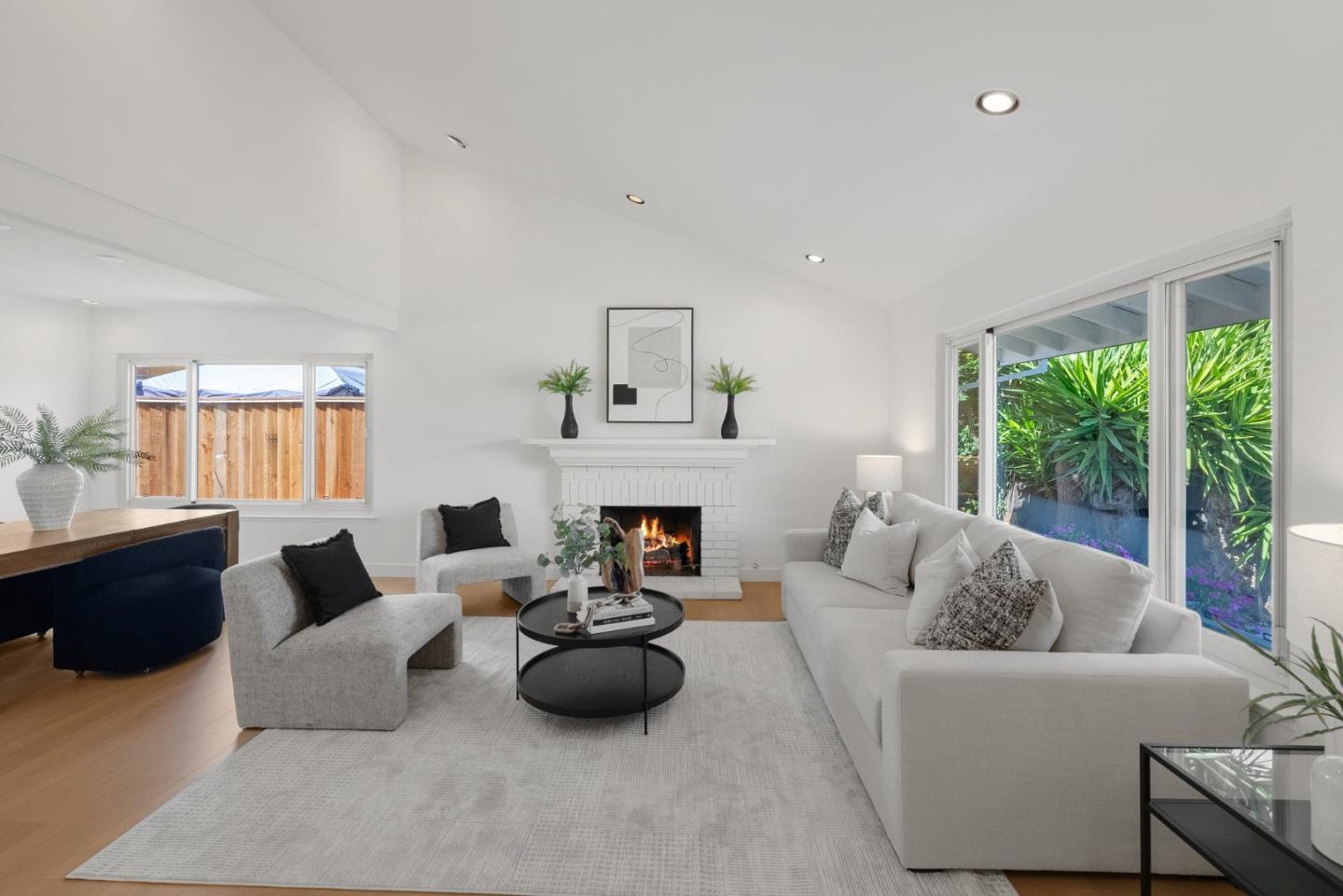 4624 Fuller Street Santa Clara, CA 95054 - Photo 2 of 26 a living room with furniture and a fireplace