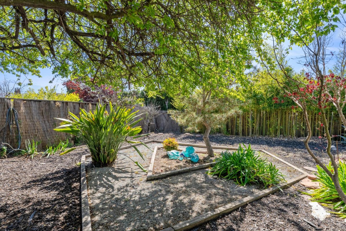 4624 Fuller Street Santa Clara, CA 95054 - Photo 25 of 26 a backyard of a house with lots of green space