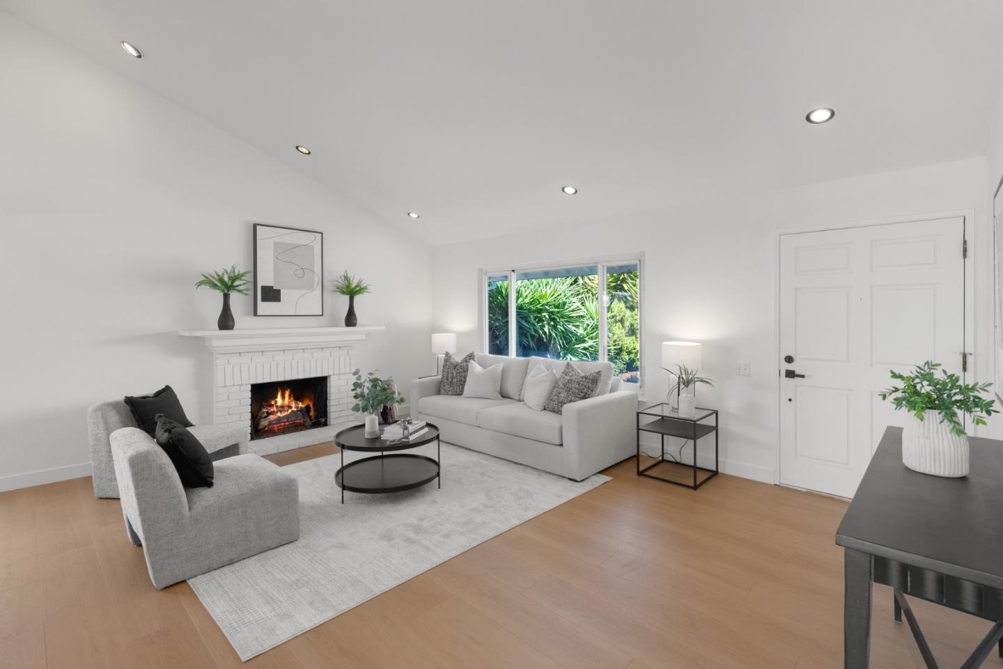 4624 Fuller Street Santa Clara, CA 95054 - Photo 3 of 26 a living room with furniture and a fireplace