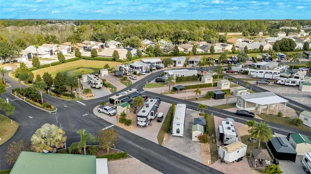 an aerial view of a house with a ocean view