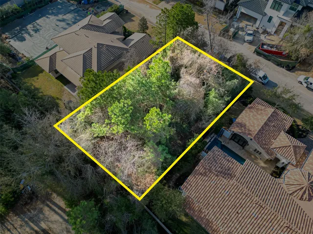 an aerial view of house with garden