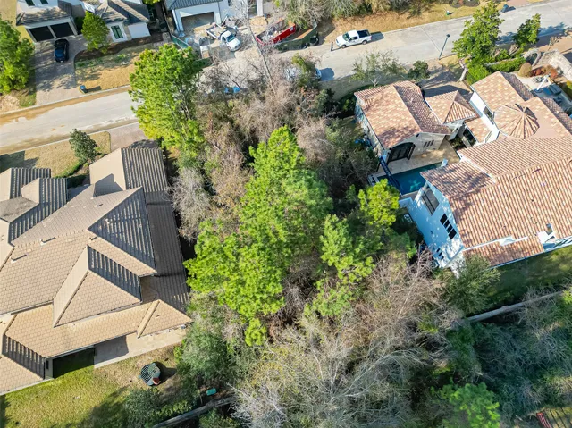 an aerial view of residential house with outdoor space
