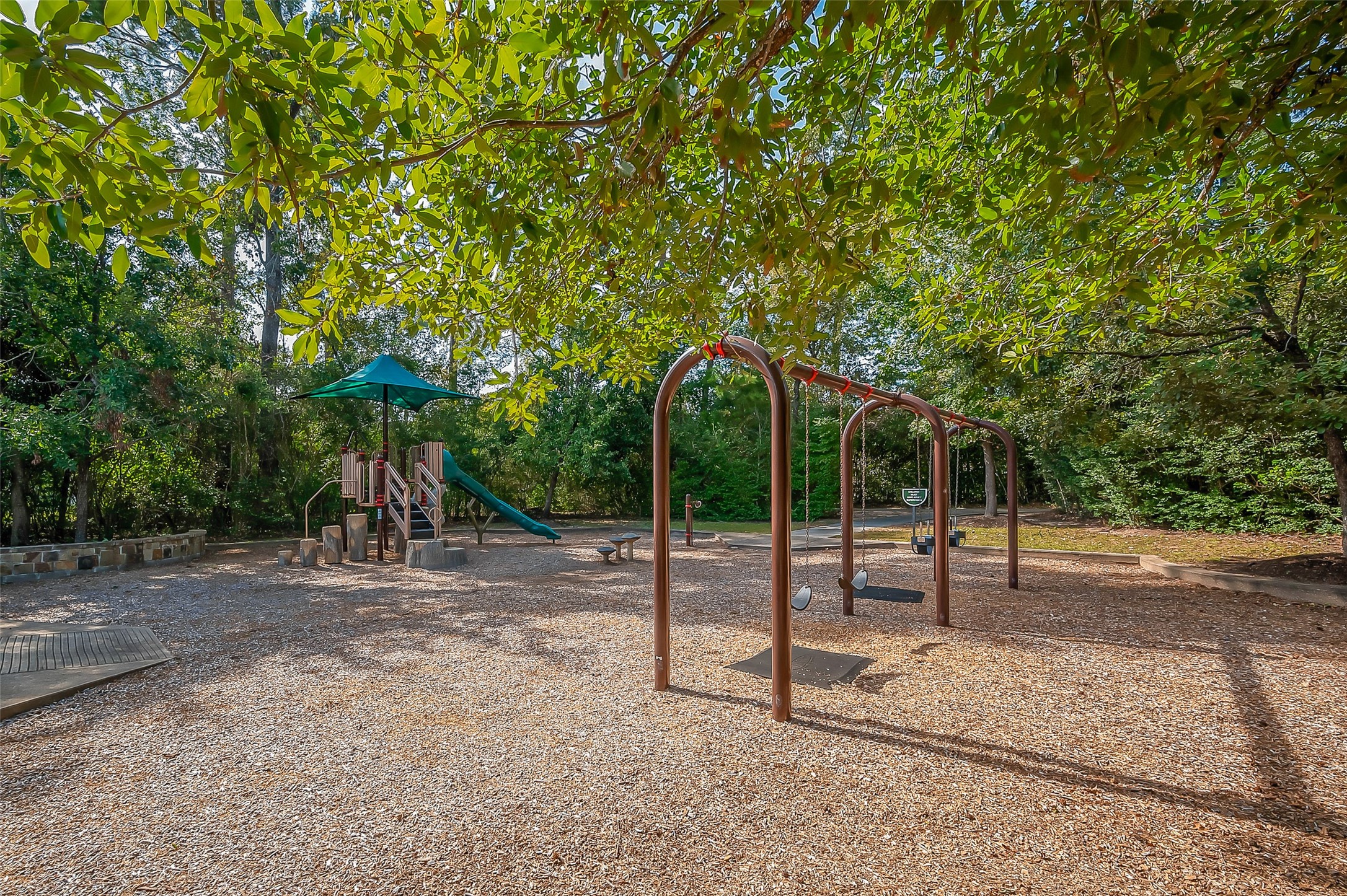 39 Pronghorn Place Spring, TX 77389 - Photo 27 of 39 a view of a park with slide