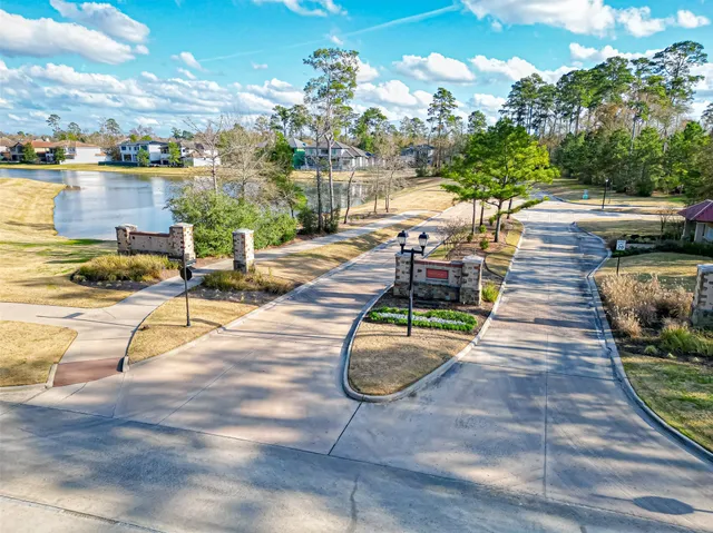 a view of a swimming pool with lounge chair