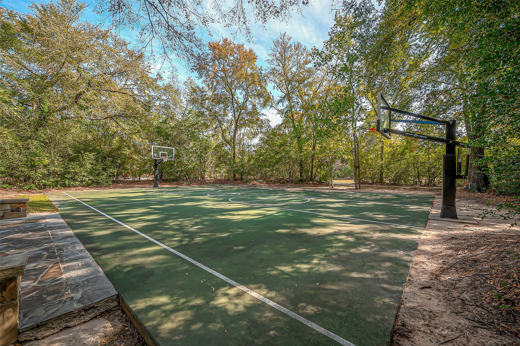 39 Pronghorn Place Spring, TX 77389 - Photo 32 of 39 a view of a tennis ground