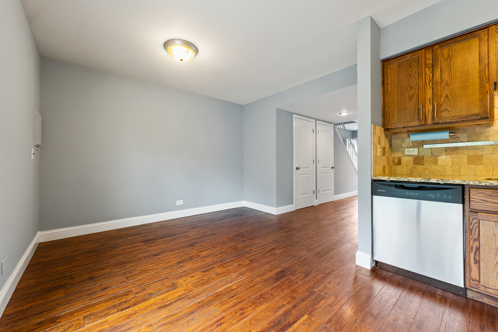 362 Rodenburg Road Roselle, IL 60172 - Photo 8 of 19 wooden floor in an empty room with a window
