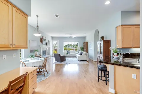 a very nice looking kitchen with a table and chairs