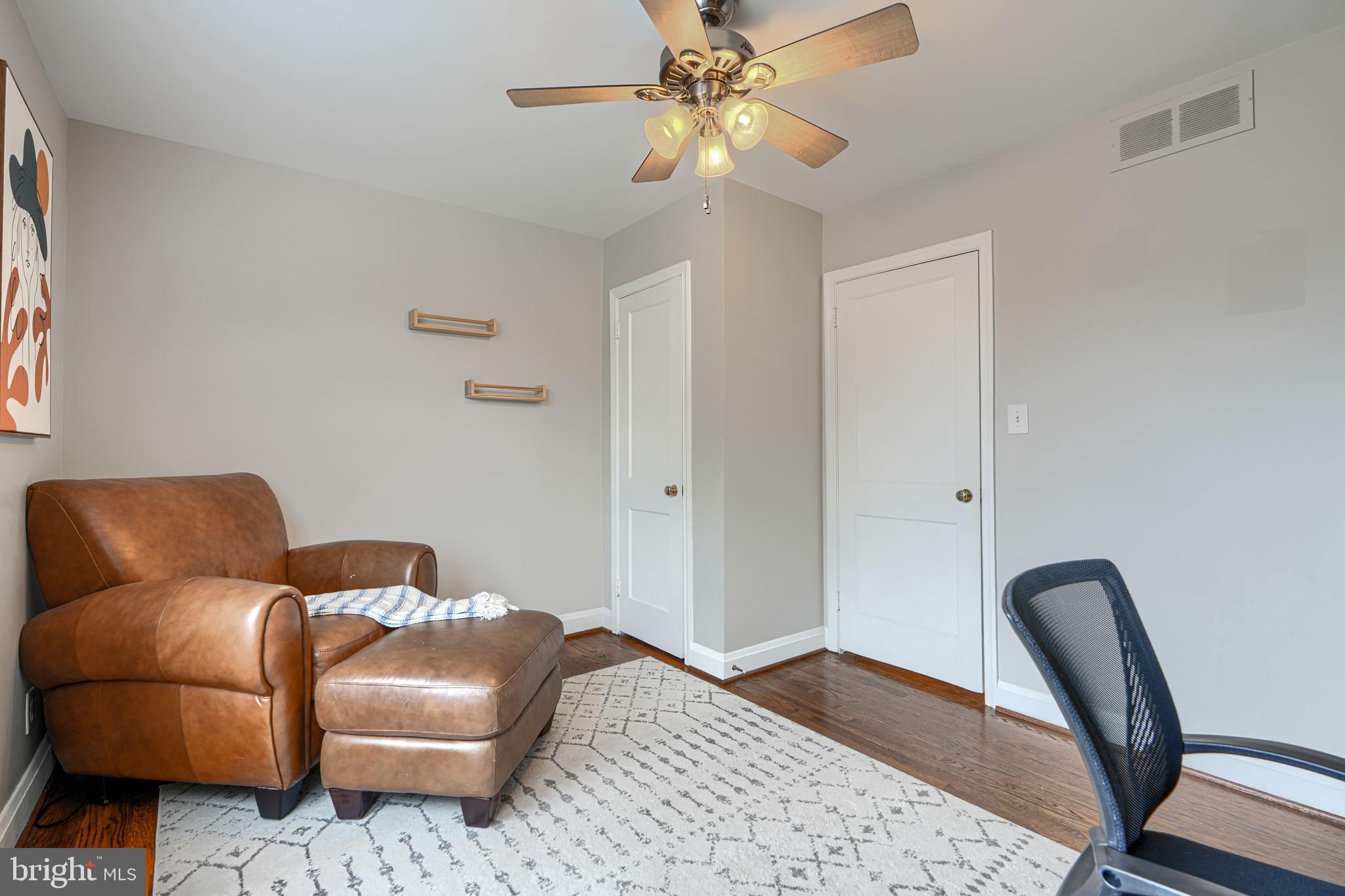 8132 Pleasant Plains Road Towson, MD 21286 - Photo 24 of 55 a bedroom with furniture and wooden floor
