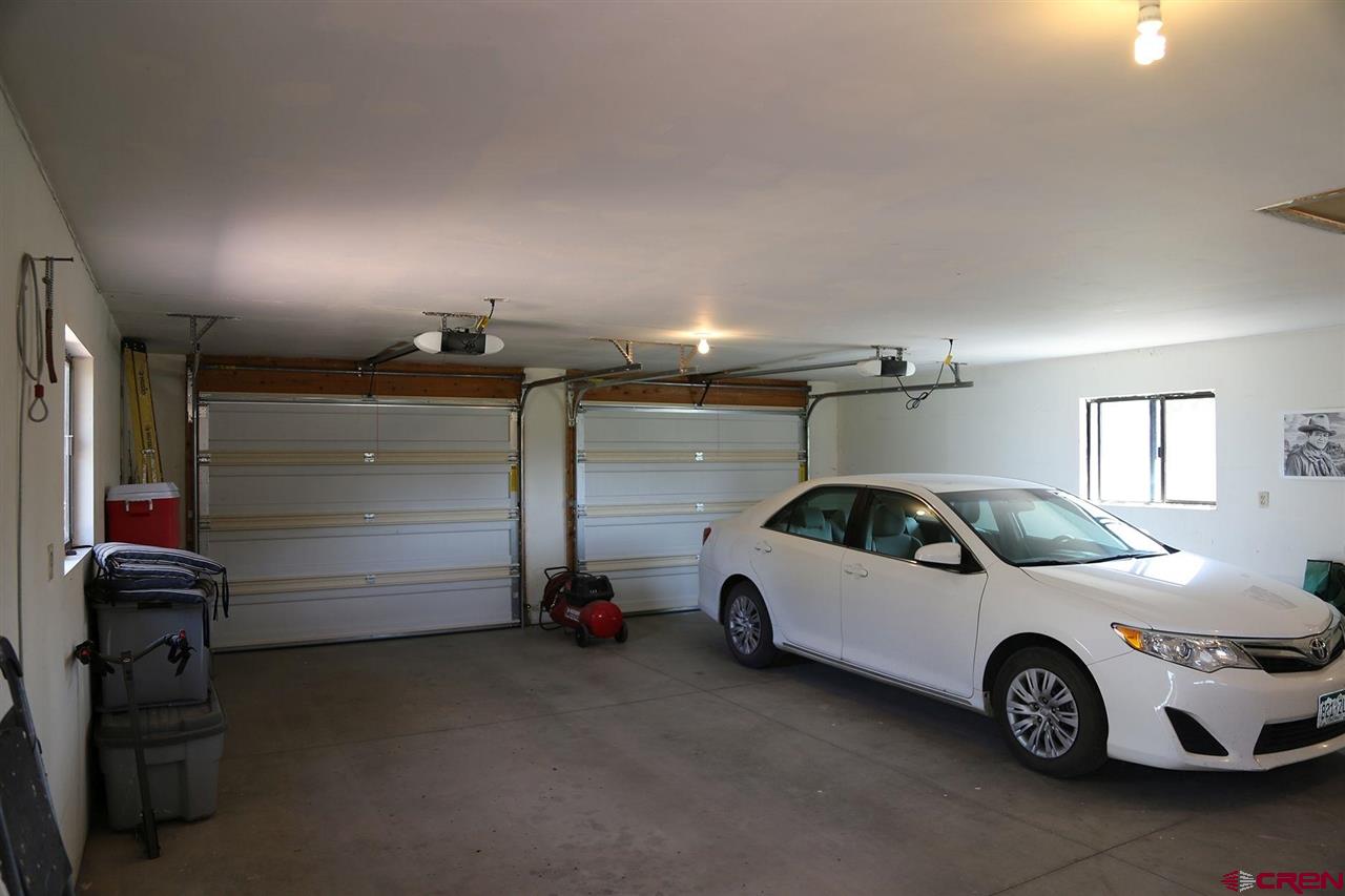 3946 1550 Road Delta, CO 81416 - Photo 21 of 35 a view of parking garage with cars