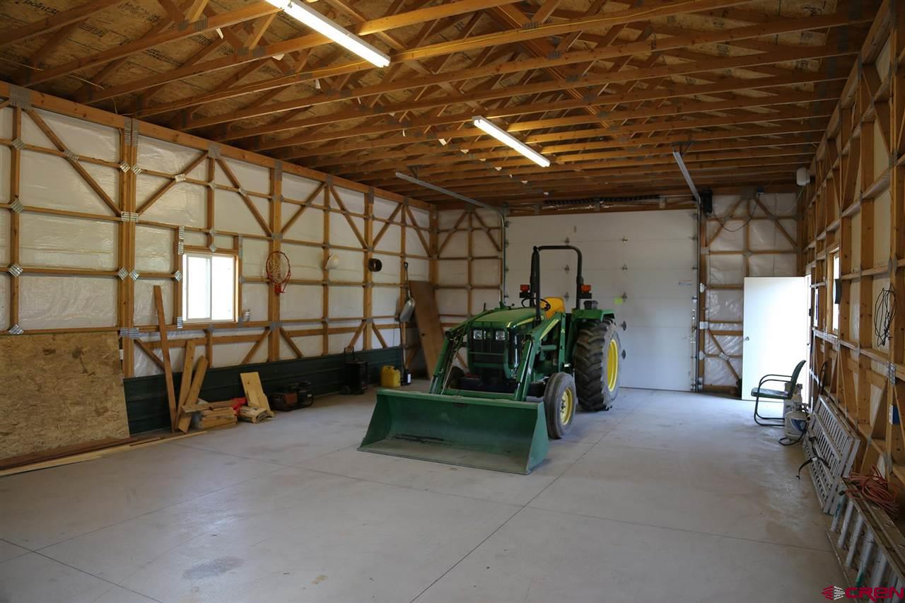 3946 1550 Road Delta, CO 81416 - Photo 26 of 35 a view of a room with gym equipment