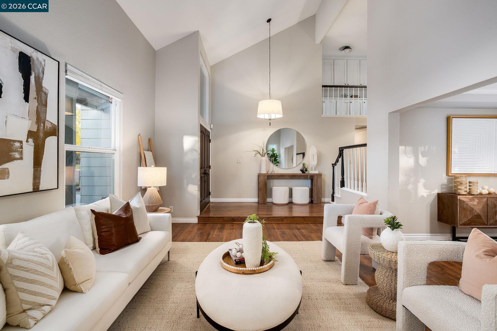 633 Lomond Circle San Ramon, CA 94583 - Photo 5 of 39 a living room with furniture a lamp and a potted plant