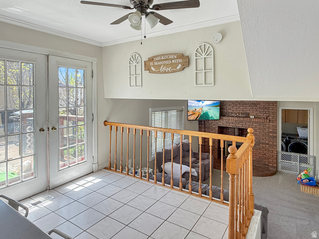 1716 Sagewood Road Price, UT 84501 - Photo 16 of 73 Doorway to outside with crown molding, a ceiling fan, a textured ceiling, french doors, and tile patterned flooring