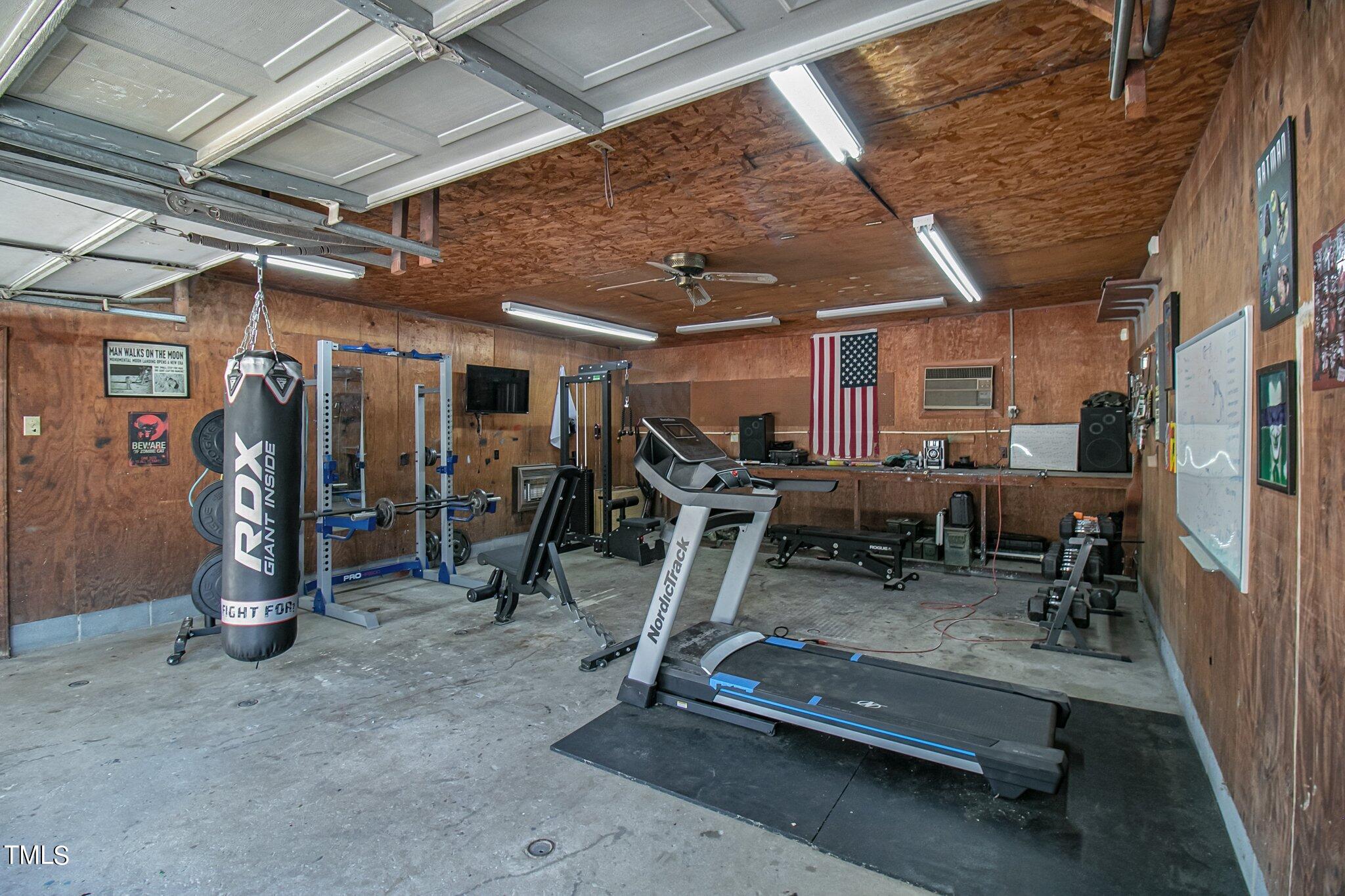 6262 Smithfield Road Wade, NC 28395 - Photo 38 of 53 a view of a room with gym equipment