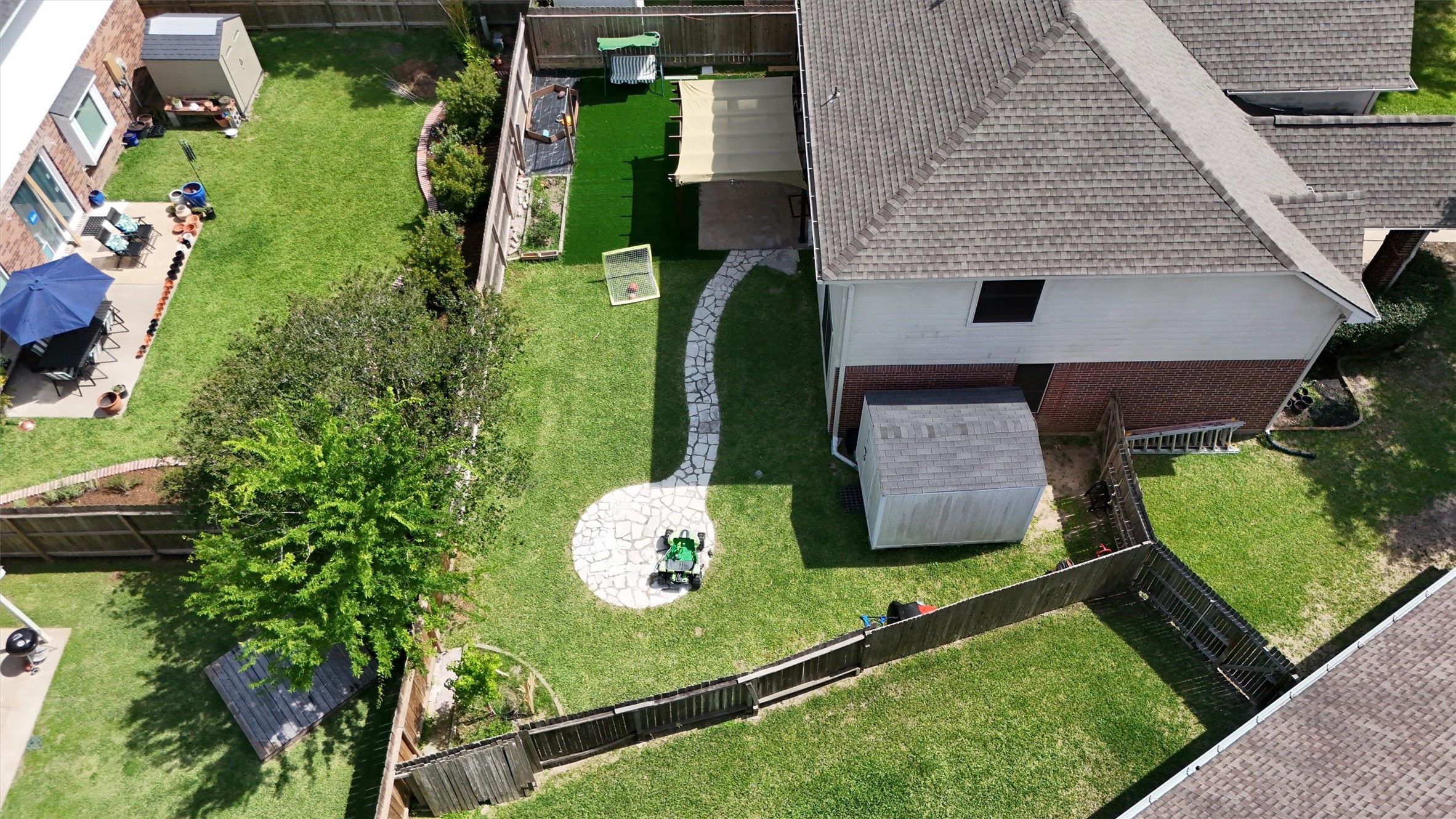 10054 Rio Bravo Road Houston, TX 77064 - Photo 36 of 41 Aerial view of the spacious backyard ready for entertainment