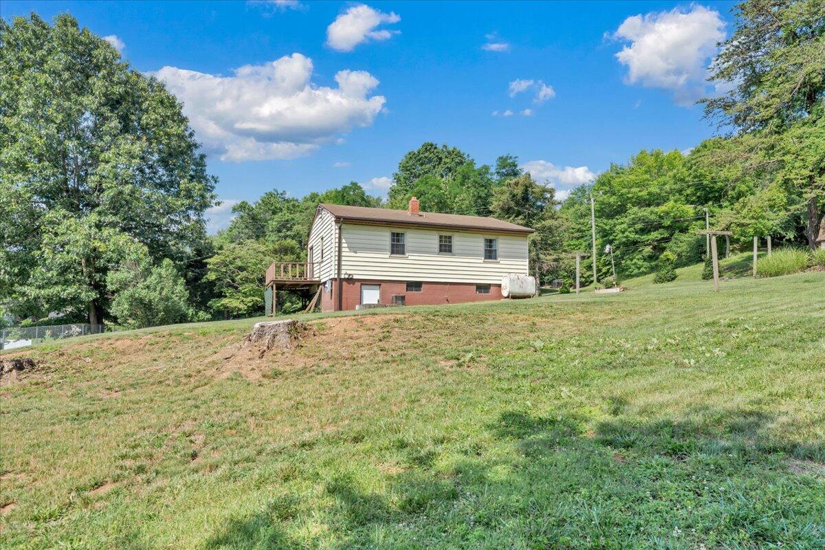 201 Long Avenue Covington, VA 24426 - Photo 32 of 43 a front view of a house with a yard