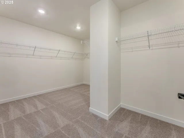 a view of a room with racks on the wall