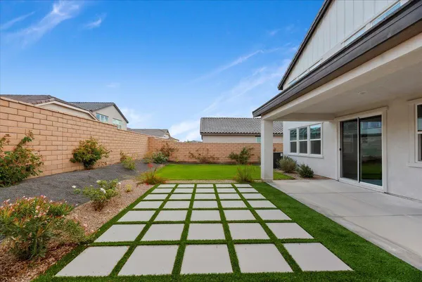 a view of a backyard with a garden