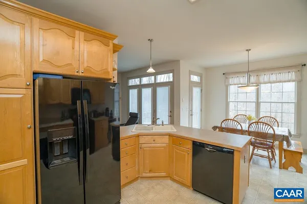 a very nice looking dining room with furniture