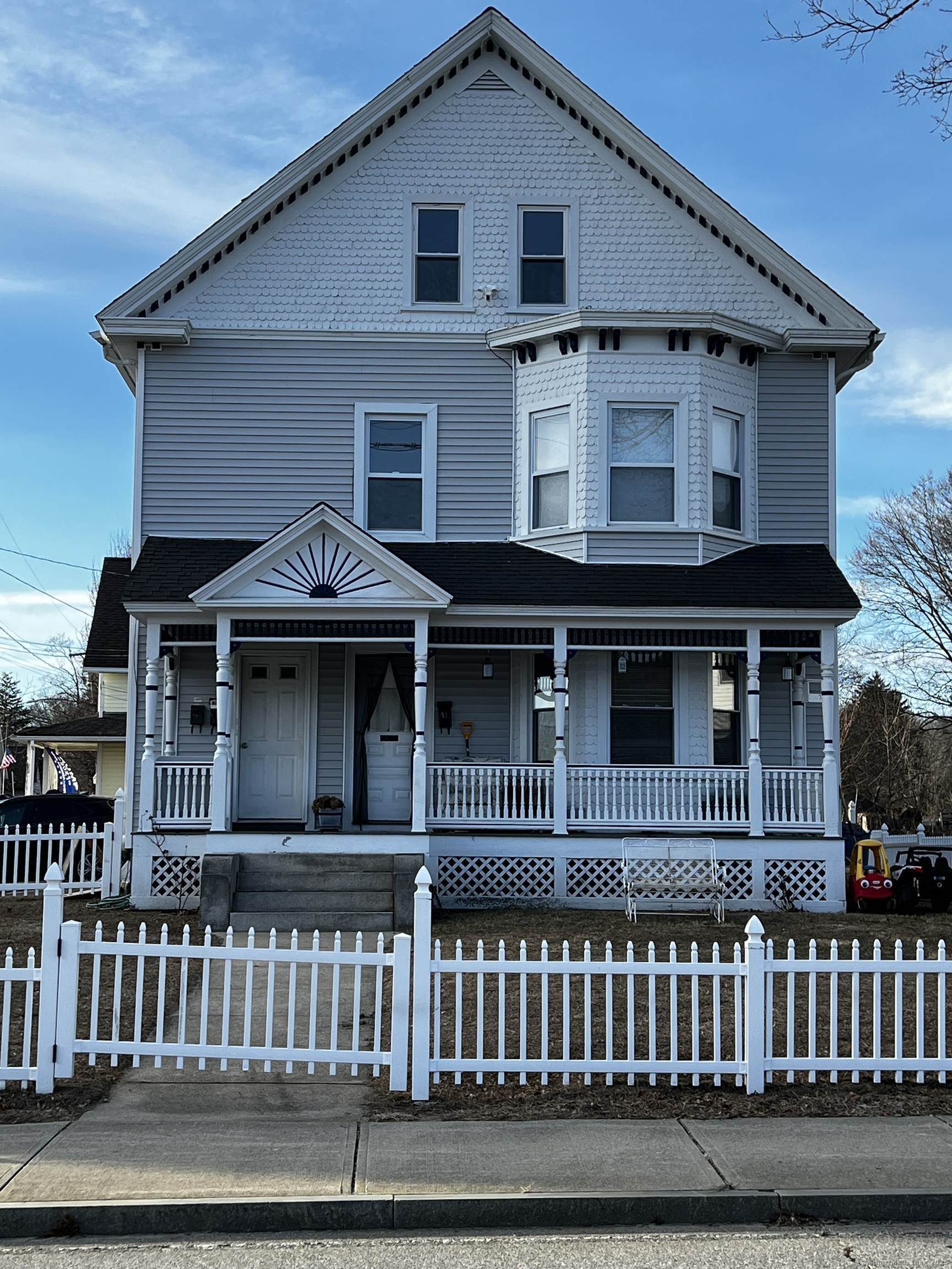 39-43 Main Street Plainfield, CT 06354 - Photo 1 of 1 a front view of a house with a porch