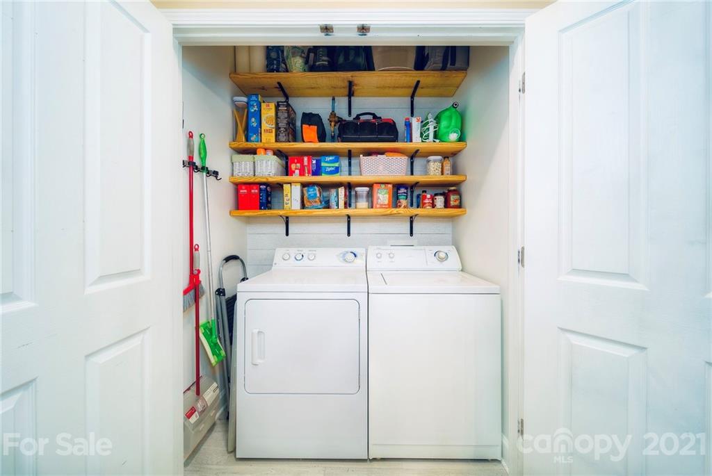 4142 Walker Road Charlotte, NC 28211 - Photo 16 of 18 a utility room with dryer and washer